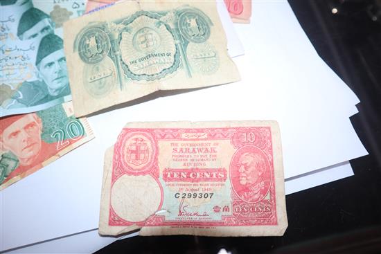 A collection of African and Egyptian currency, including Bank of Biafra banknotes,